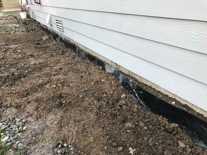 Tree root barrier roll installed in trench
